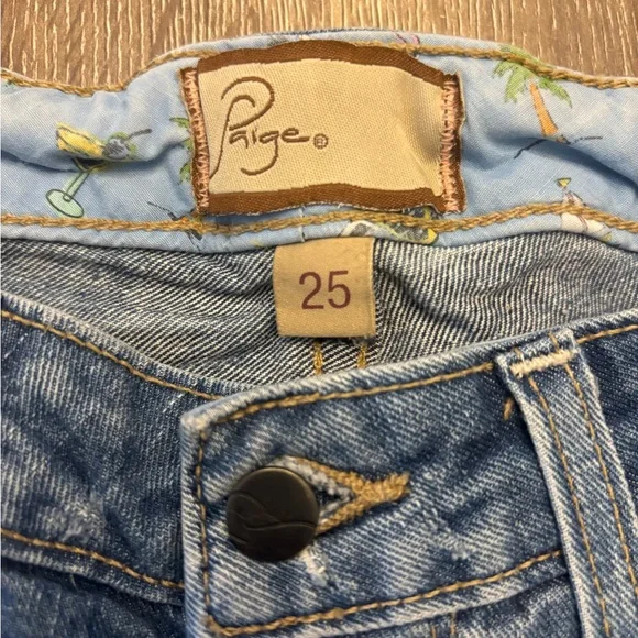 PAIGE Distressed Medium Blue Denim Shorts - Picture 3 of 8